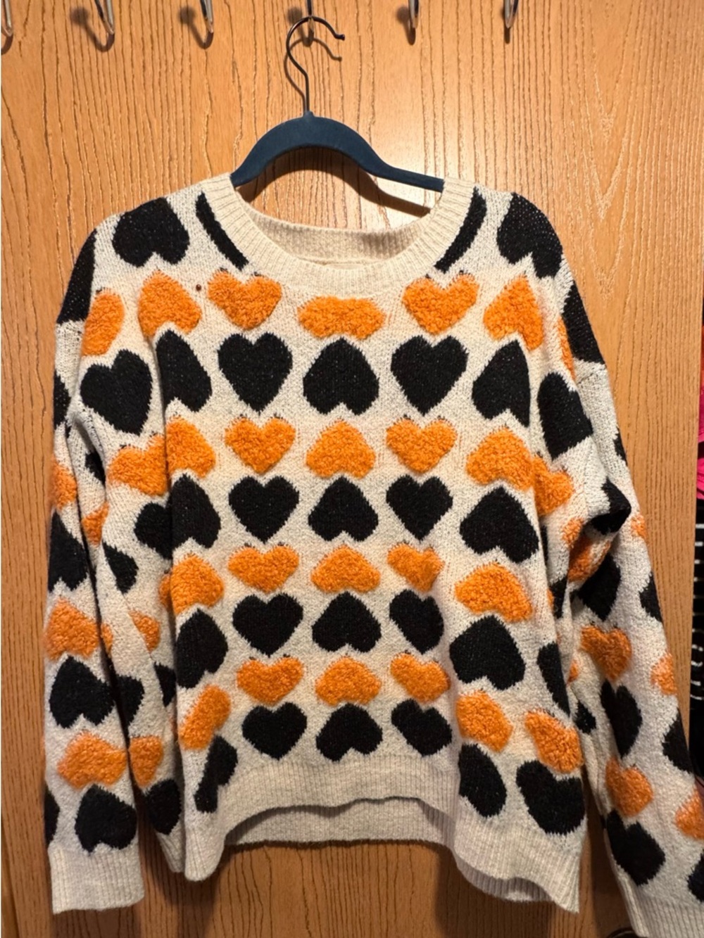 BiBi Cream Crewneck Sweater with Black & Orange Heart Motif